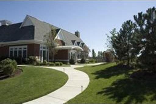 view of side of property featuring a yard