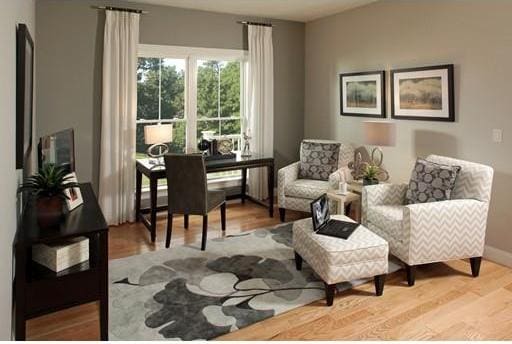 sitting room with light hardwood / wood-style floors