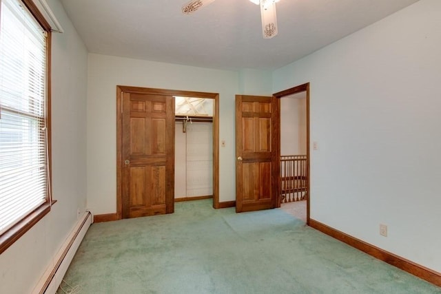 46 Baremeadow St, Methuen, MA 01844 - unfurnished bedroom with baseboard heating, light colored carpet, multiple windows, and a closet