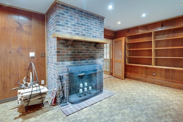 46 Baremeadow St, Methuen, MA 01844 - unfurnished living room featuring wooden walls, a brick fireplace, recessed lighting, and parquet flooring