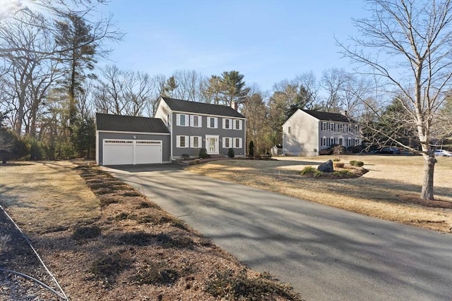 view of front facade featuring an attached garage and concrete driveway