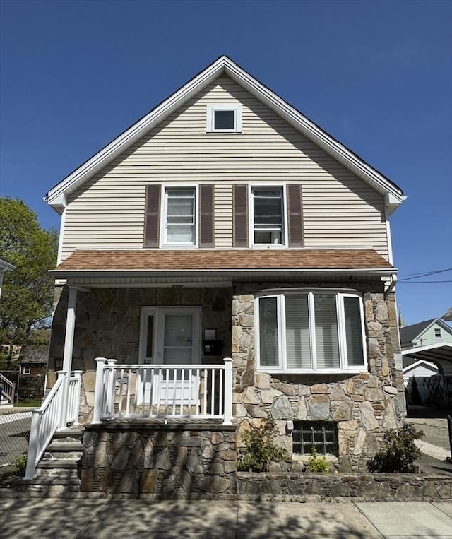 100 Bonney St, New Bedford, MA 02740 - view of front of home with covered porch and stone siding