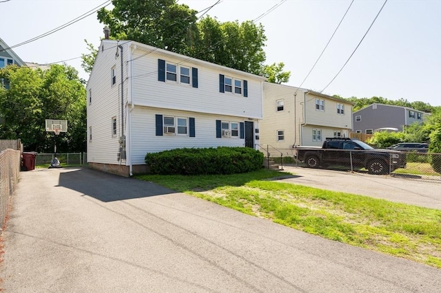 258-260 Pleasant St, Lowell, MA 01852 - colonial inspired home featuring asphalt driveway