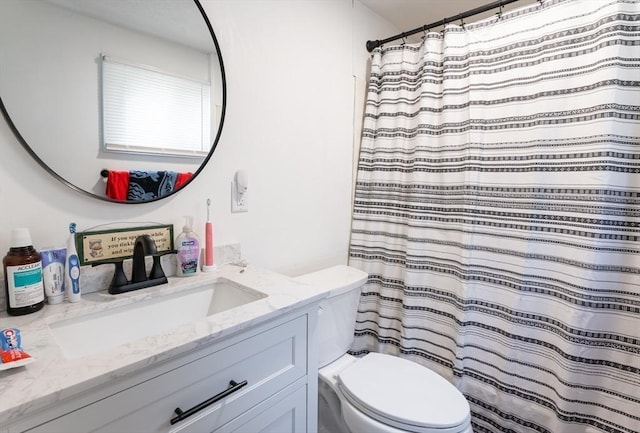 258-260 Pleasant St, Lowell, MA 01852 - full bath with toilet, vanity, and a shower with shower curtain