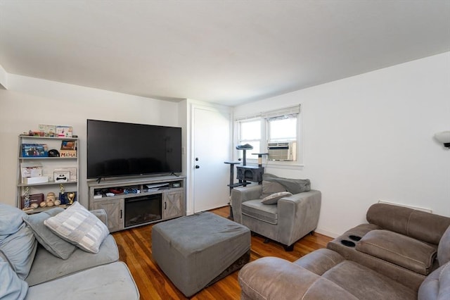 258-260 Pleasant St, Lowell, MA 01852 - living room with wood finished floors and cooling unit