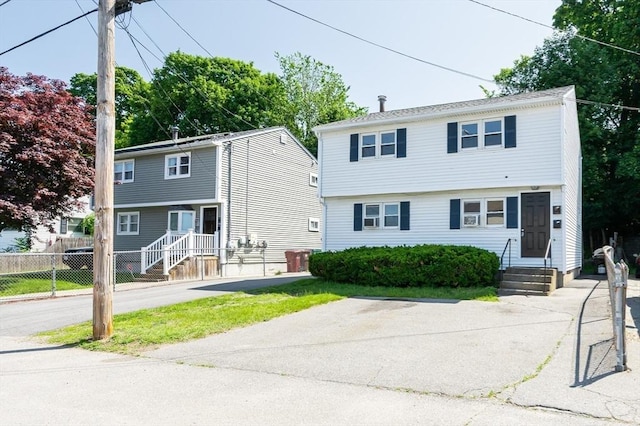 258-260 Pleasant St, Lowell, MA 01852 - colonial inspired home featuring entry steps