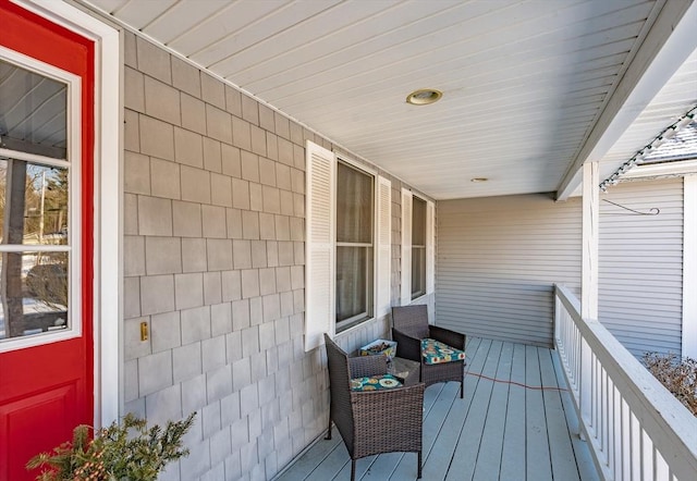 wooden deck featuring a porch