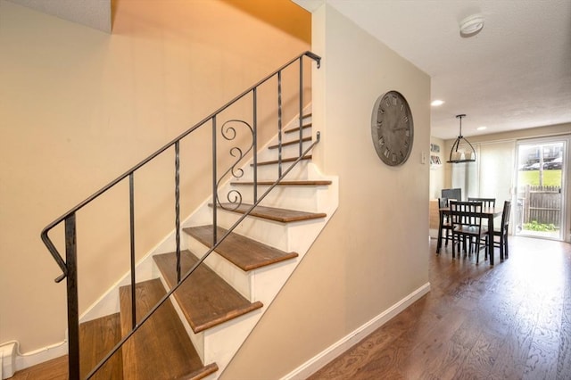 1608 Plymouth St Unit 1608, East Bridgewater, MA 02333 - staircase featuring baseboards, wood finished floors, recessed lighting, and a chandelier