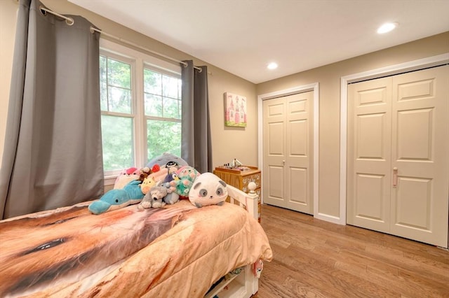 1608 Plymouth St Unit 1608, East Bridgewater, MA 02333 - bedroom with light wood-style floors, multiple closets, and recessed lighting