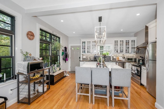 6 Edgehill Rd, Billerica, MA 01862 - kitchen with stainless steel appliances, tasteful backsplash, plenty of natural light, and recessed lighting