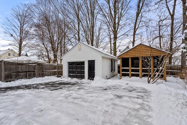 view of snow covered garage