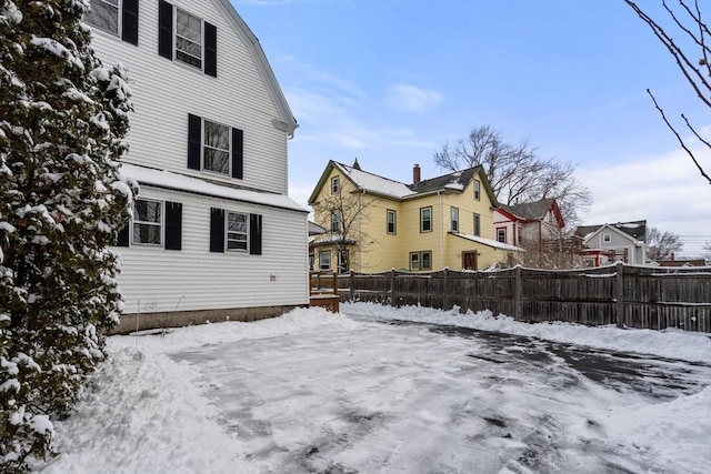 view of snow covered house