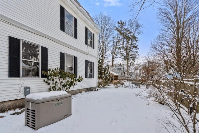 view of snow covered property