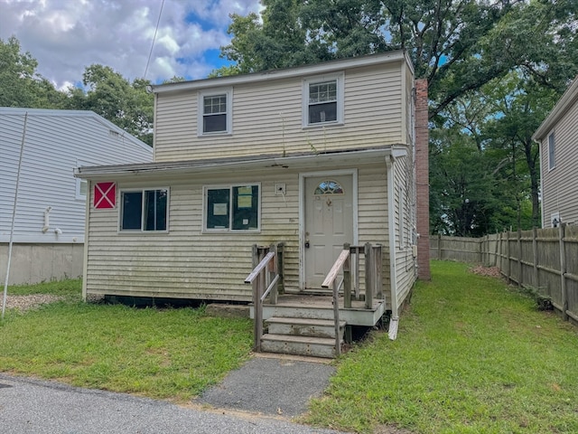 view of front of home with a front yard