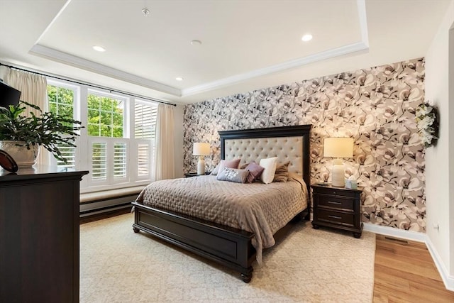 109 Phoebe St Unit 109, Methuen, MA 01844 - bedroom featuring wallpapered walls, a tray ceiling, light wood finished floors, and crown molding