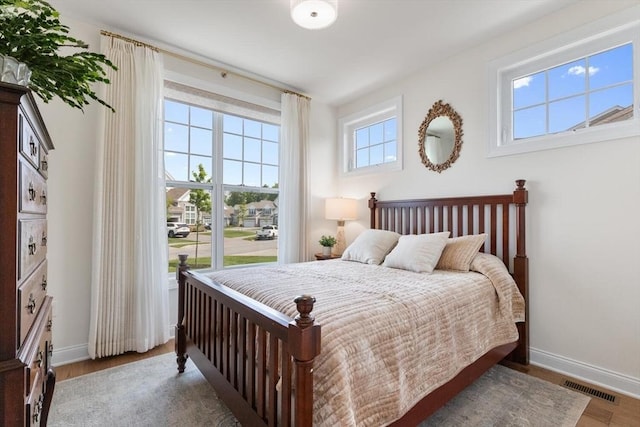 109 Phoebe St Unit 109, Methuen, MA 01844 - bedroom with baseboards and wood finished floors