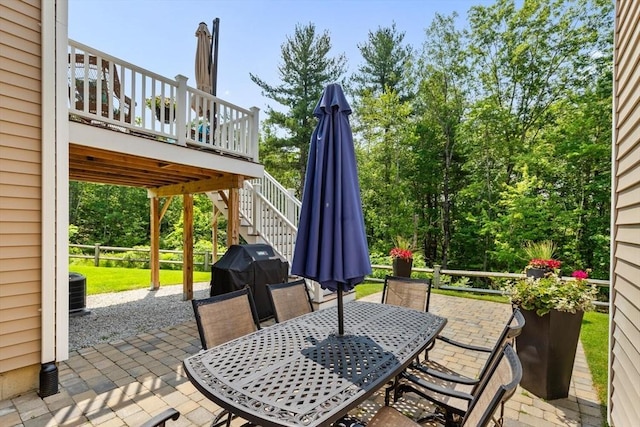 109 Phoebe St Unit 109, Methuen, MA 01844 - view of patio with area for grilling, outdoor dining area, stairway, and a deck