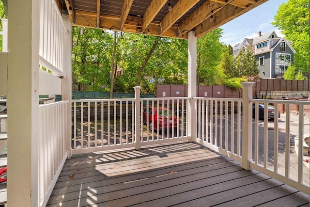 wooden deck featuring fence