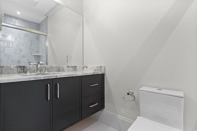 bathroom featuring a shower with shower door and tile patterned floors