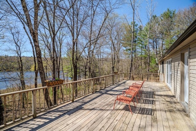 wooden terrace with a water view