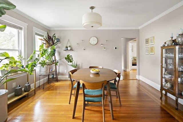 17 Eliot St Unit 17, Medford, MA 02155 - dining space featuring crown molding and light wood-type flooring