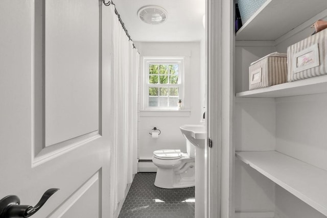 5 Eclipse Ave, Chelmsford, MA 01824 - full bathroom featuring toilet, tile patterned flooring, baseboard heating, and a shower with shower curtain