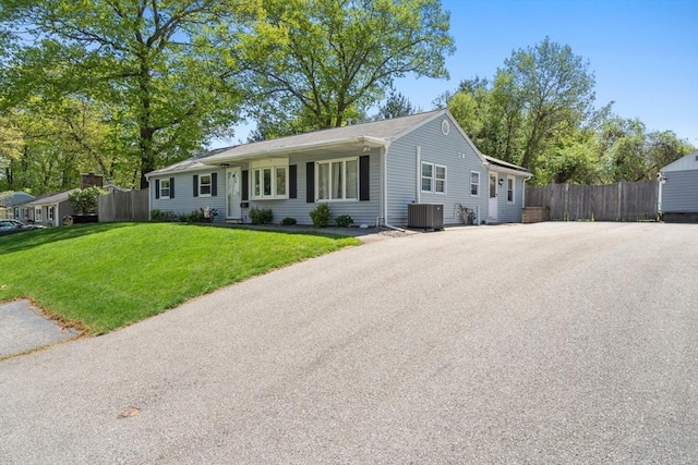 5 Eclipse Ave, Chelmsford, MA 01824 - ranch-style house featuring central air condition unit