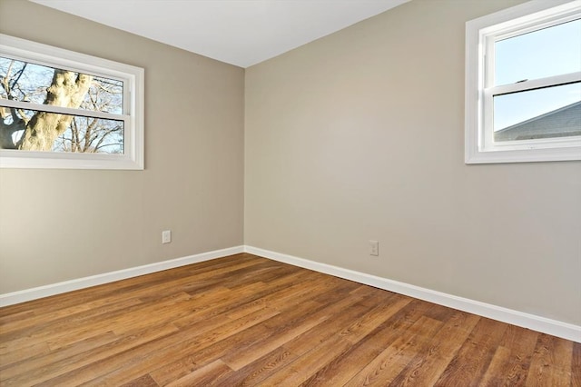 empty room featuring hardwood / wood-style floors