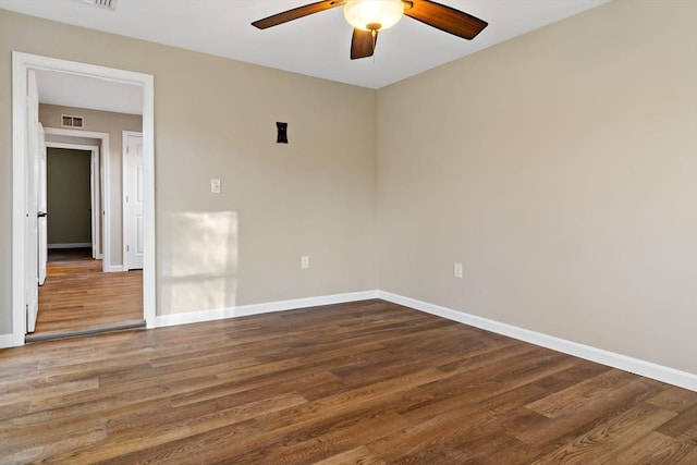 unfurnished room featuring hardwood / wood-style flooring and ceiling fan