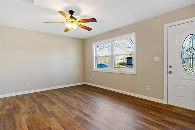 entryway with ceiling fan and dark hardwood / wood-style flooring