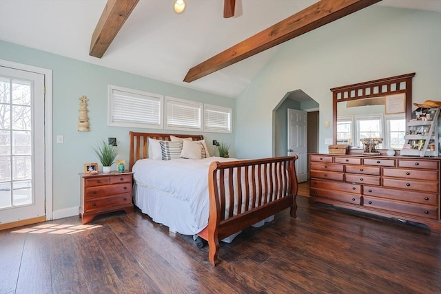 bedroom with dark wood-style flooring, lofted ceiling with beams, baseboards, and multiple windows