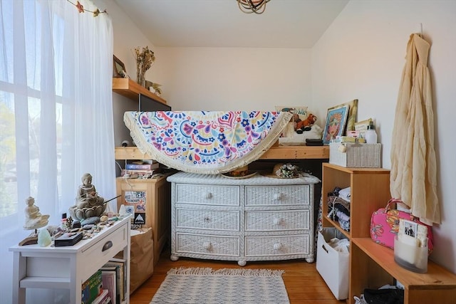 bedroom featuring wood finished floors
