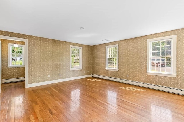 57 Rudon Dr, North Attleboro, MA 02760 - unfurnished room featuring wood finished floors, baseboard heating, and wallpapered walls