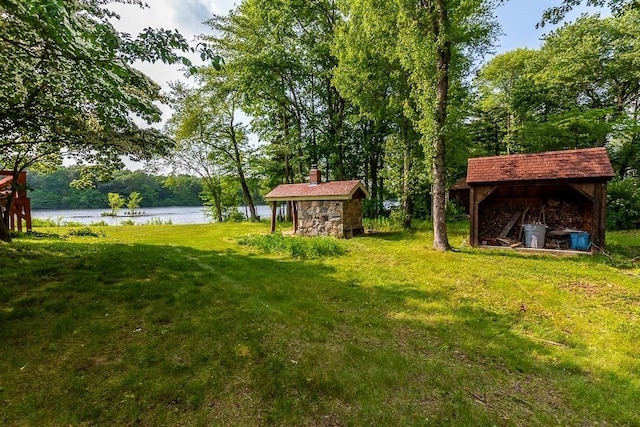 57 Rudon Dr, North Attleboro, MA 02760 - view of grassy yard featuring a water view and a storage shed