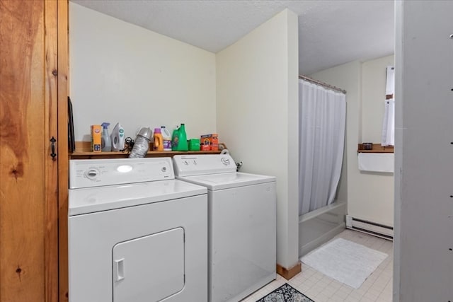 clothes washing area featuring a textured ceiling, baseboard heating, separate washer and dryer, and light tile patterned flooring