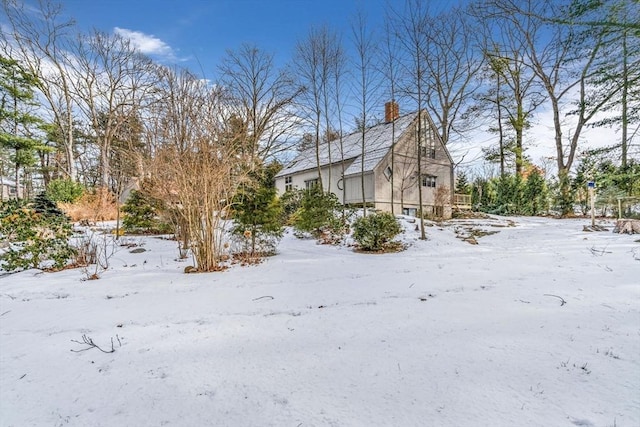 view of snow covered property