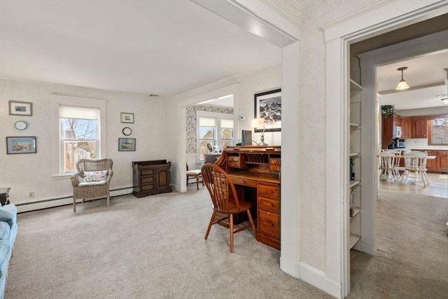 office featuring a wealth of natural light, light colored carpet, and baseboard heating