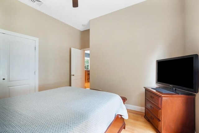 bedroom featuring ceiling fan and light hardwood / wood-style flooring