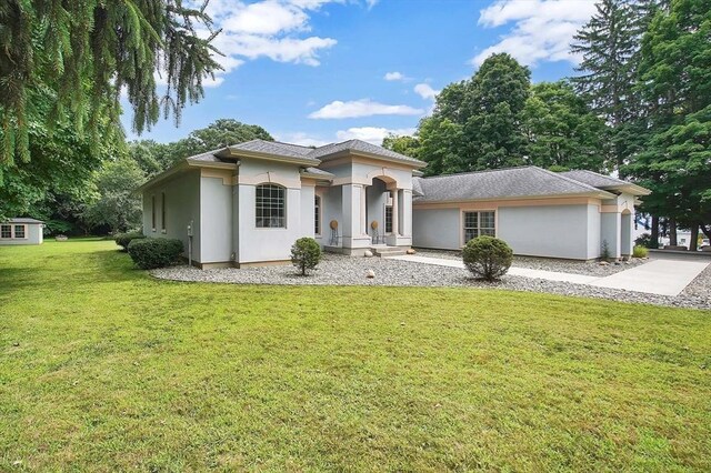 view of front of home with a front yard