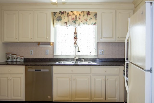 kitchen with tasteful backsplash, dishwasher, white fridge, and sink