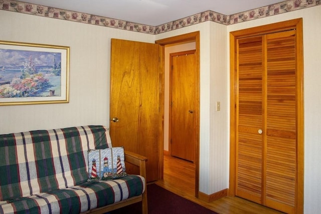 sitting room with hardwood / wood-style floors