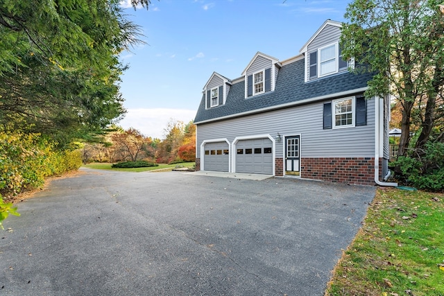 exterior space with a garage