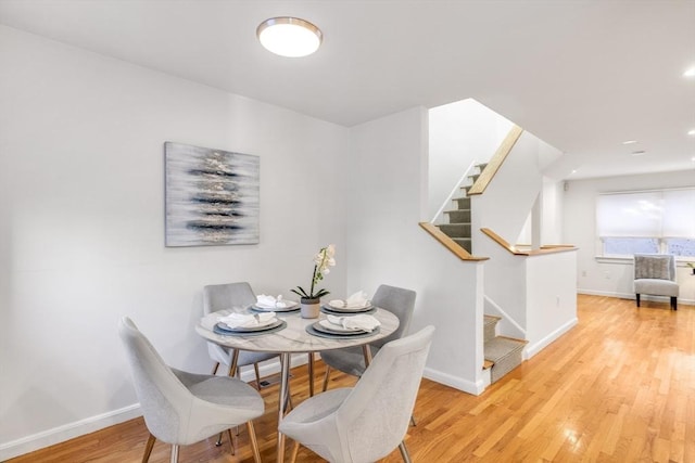 dining room featuring light hardwood / wood-style flooring