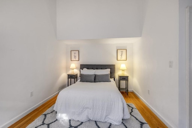 bedroom with light hardwood / wood-style flooring