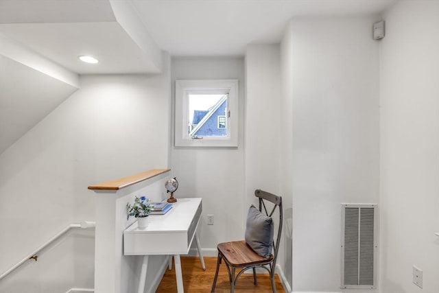 office with hardwood / wood-style flooring