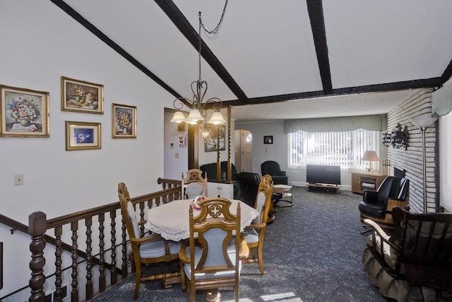 carpeted dining space with beamed ceiling, baseboards, an inviting chandelier, and high vaulted ceiling