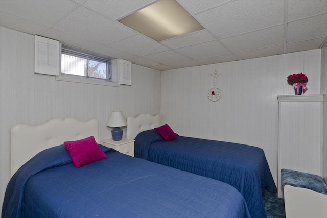 bedroom featuring a drop ceiling