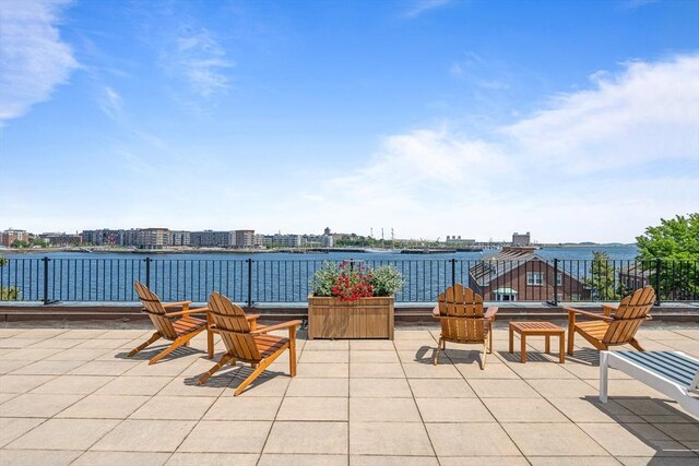 view of patio / terrace with a water view