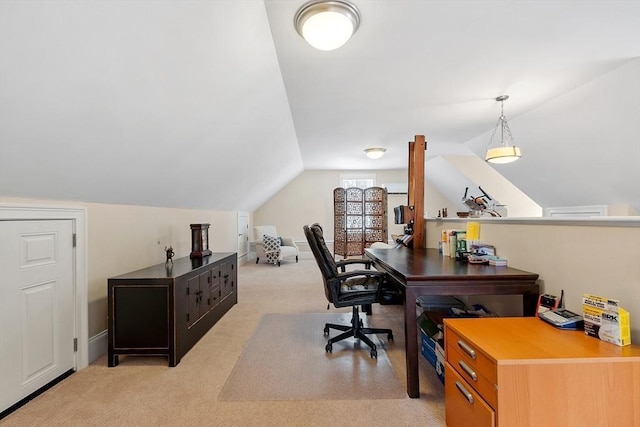 office featuring light carpet and vaulted ceiling