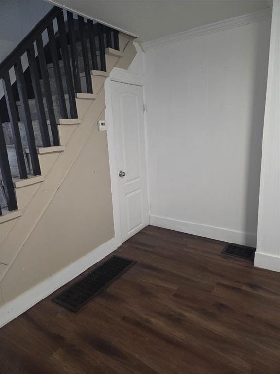 288 Quincy St, Springfield, MA 01109 - stairs with wood finished floors and ornamental molding